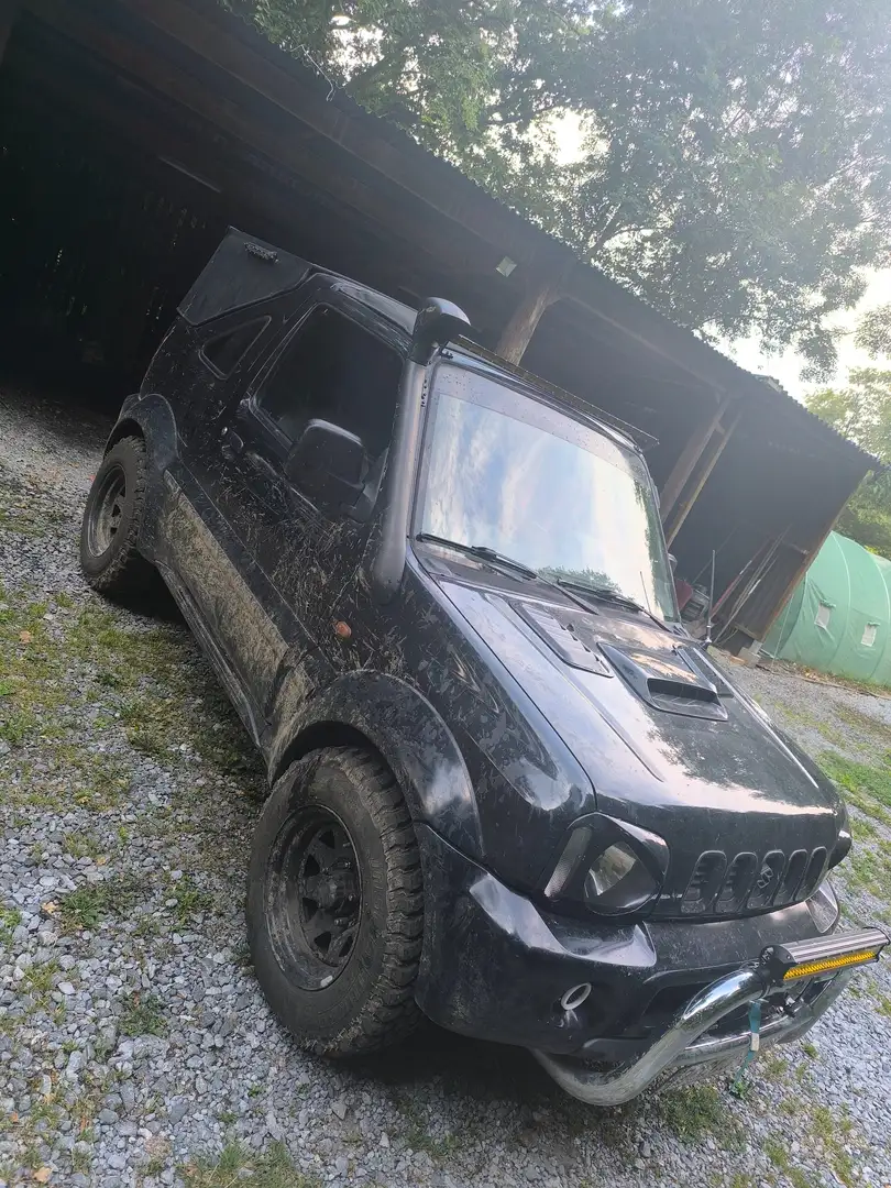 Suzuki Jimny 1.3i JLX Noir - 2