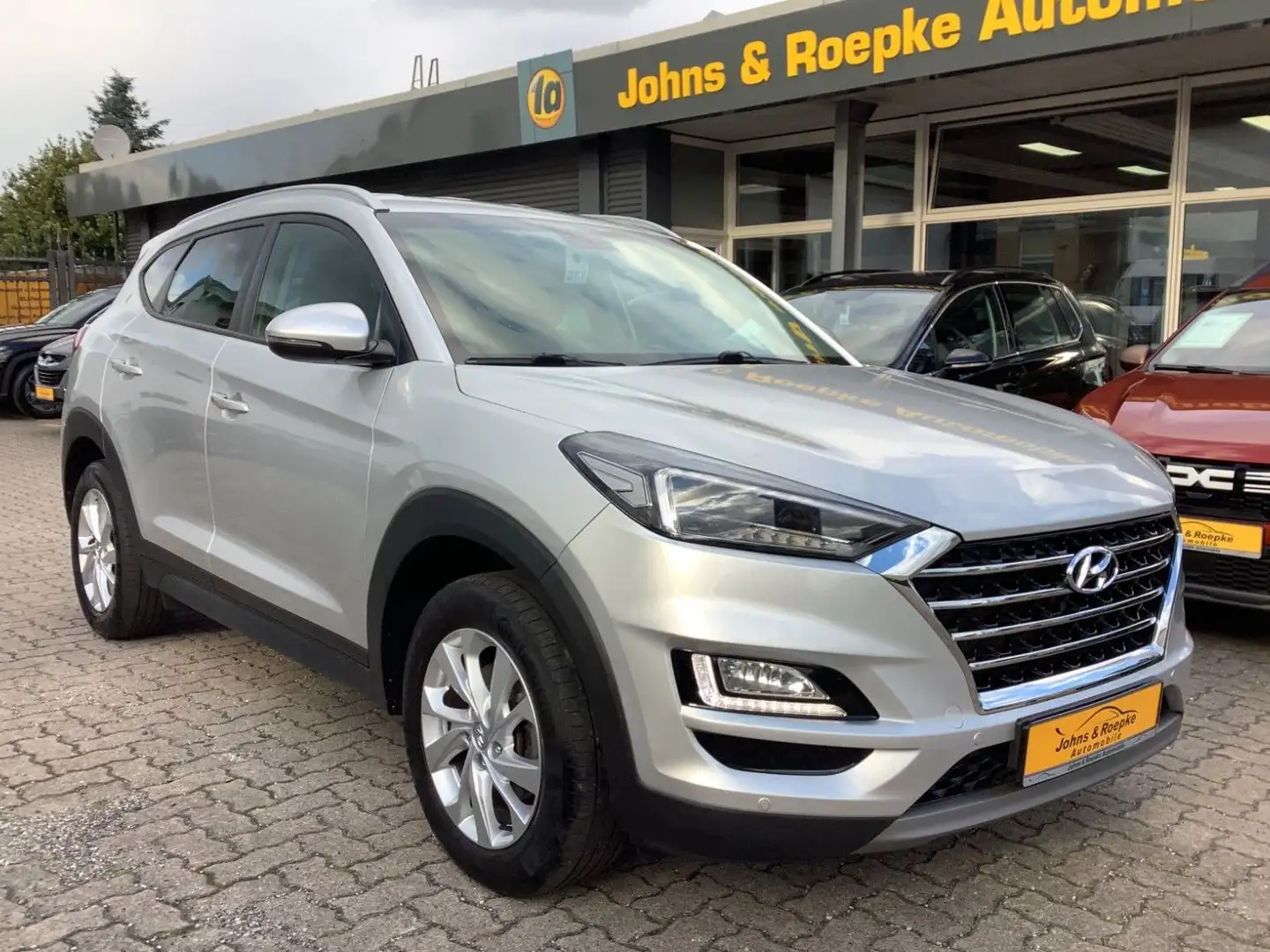Hyundai TUCSON 1,6 Automatik 4WD / KAMERA / Silber - 1