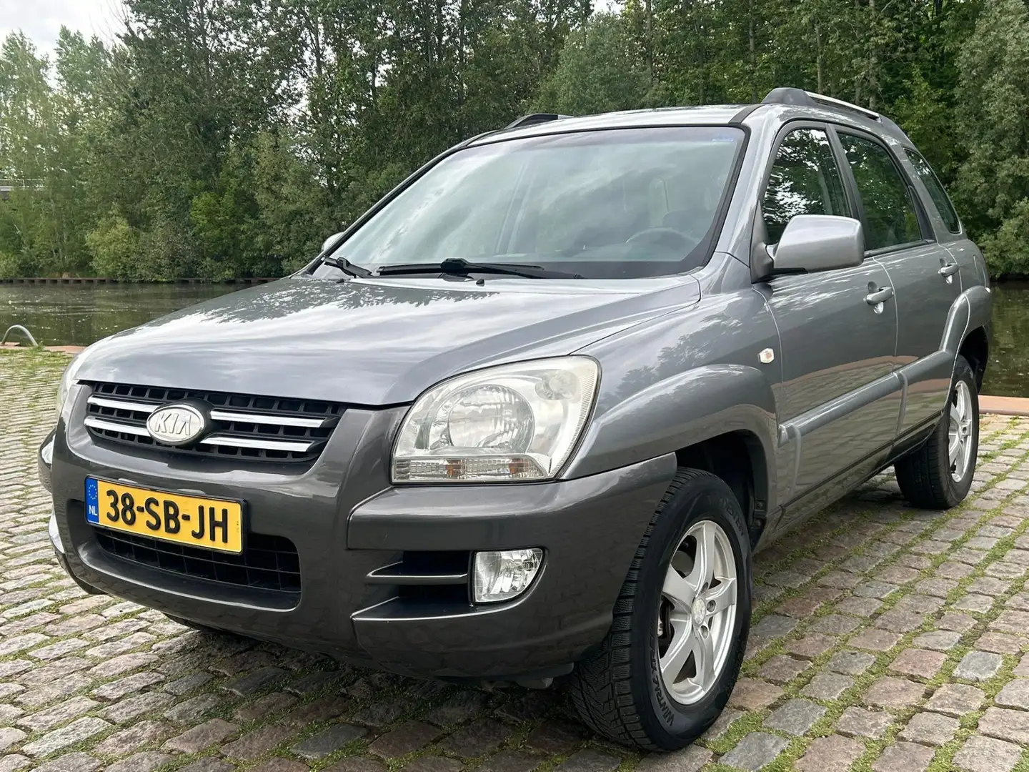Kia Sportage 2.0 CVVT Executive airco elektrische ramen cv op a Gri - 2
