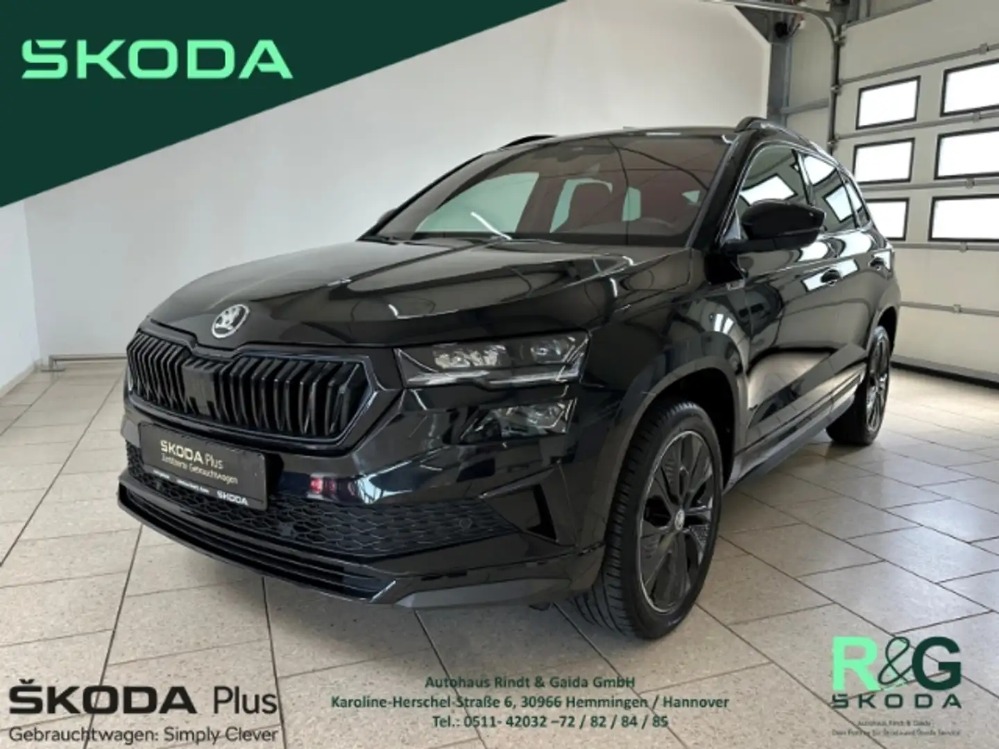 Skoda Karoq Sportline 1.5 TSI ACT DSG AHK Kamera Matrix Schwarz - 1