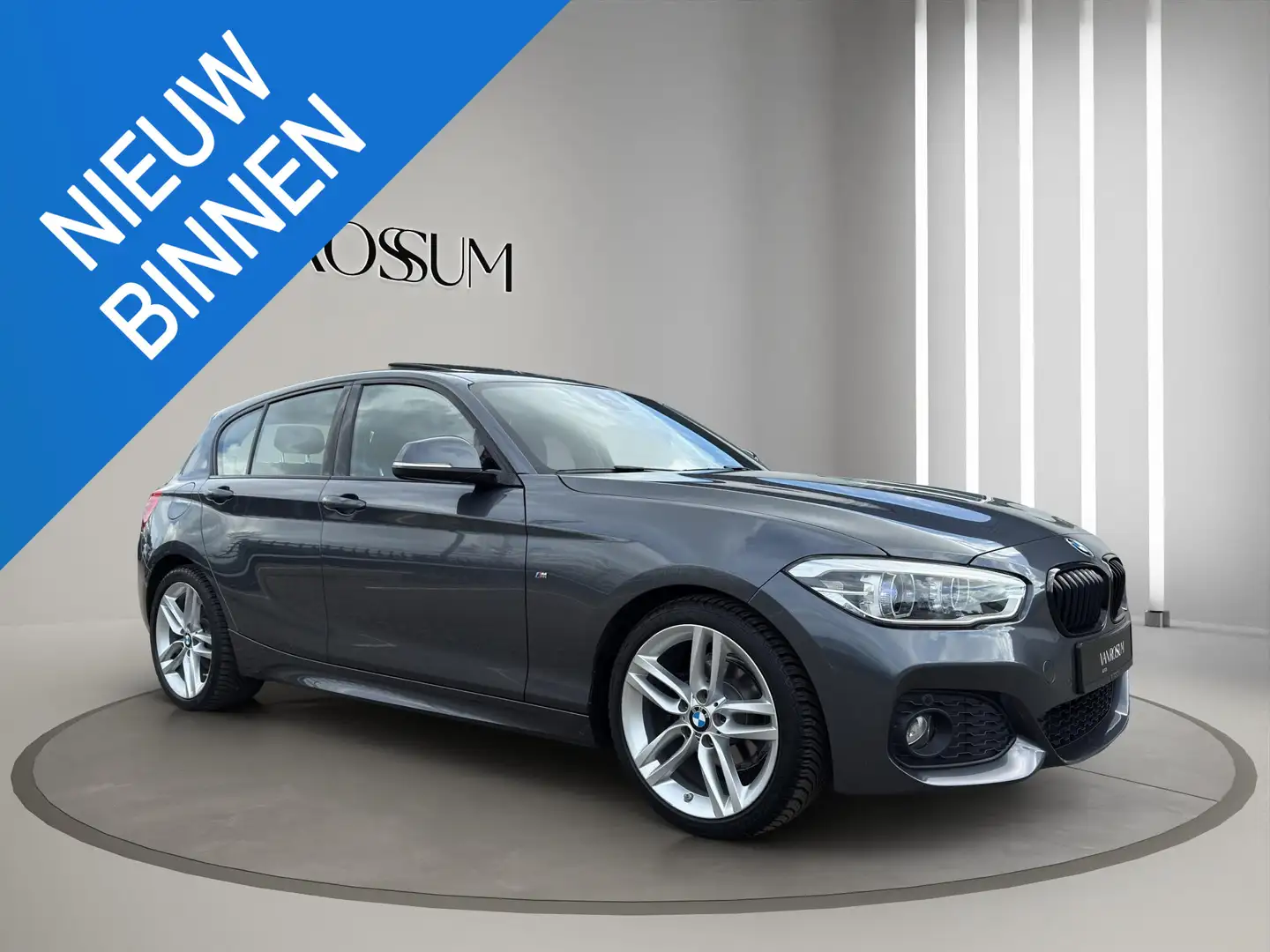 BMW 118 1-serie 118i M Sport 5 Drs | Schuif/ Kanteldak | a Grijs - 1