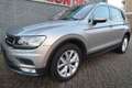 Volkswagen Tiguan 2.0 TSI 4Motion Highline Bij ons bedrijf in onderh Grau - thumbnail 1