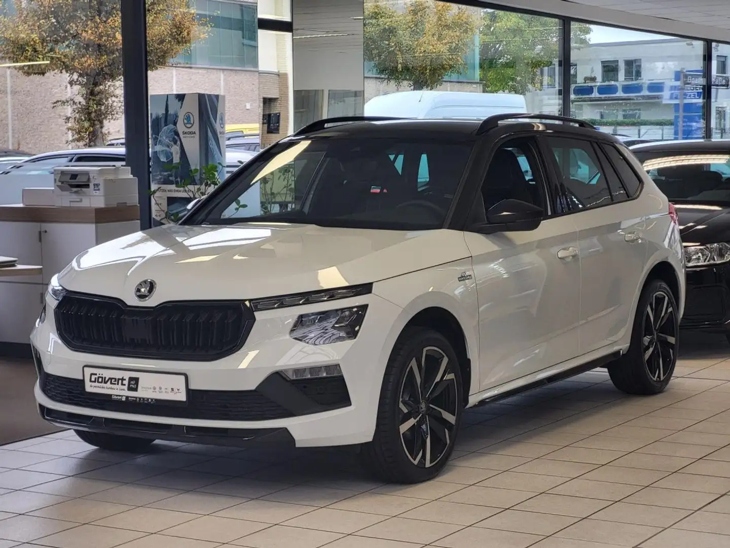 Skoda Kamiq 1.5 TSI DSG Monte Carlo 18 Zoll el. Heckkl. Weiß - 1