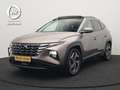 Hyundai TUCSON 1.6 T-GDI Premium 4WD Plug In Hybrid 265pk Dealer Bruin - thumbnail 1