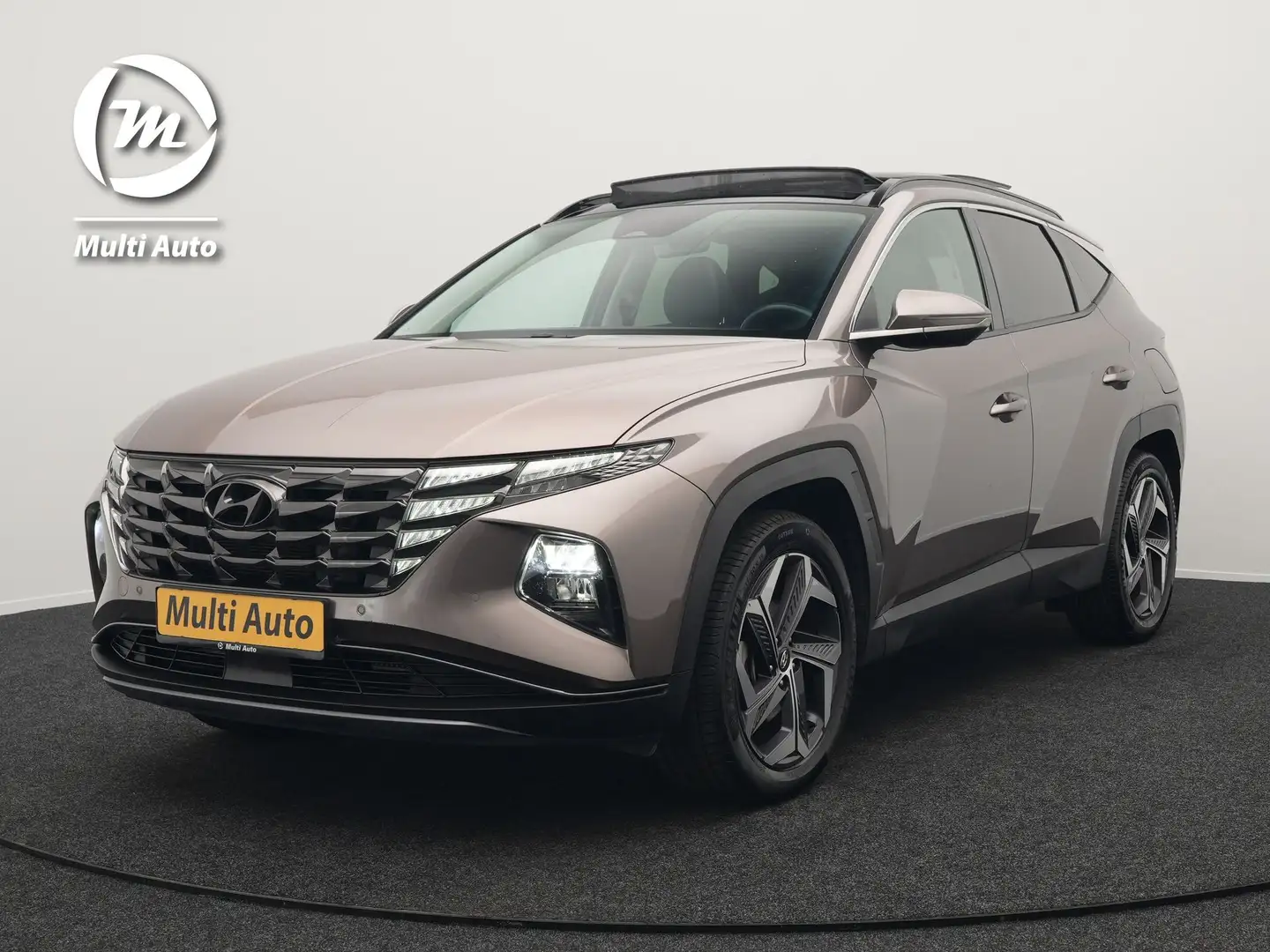 Hyundai TUCSON 1.6 T-GDI Premium 4WD Plug In Hybrid 265pk Dealer Bruin - 1
