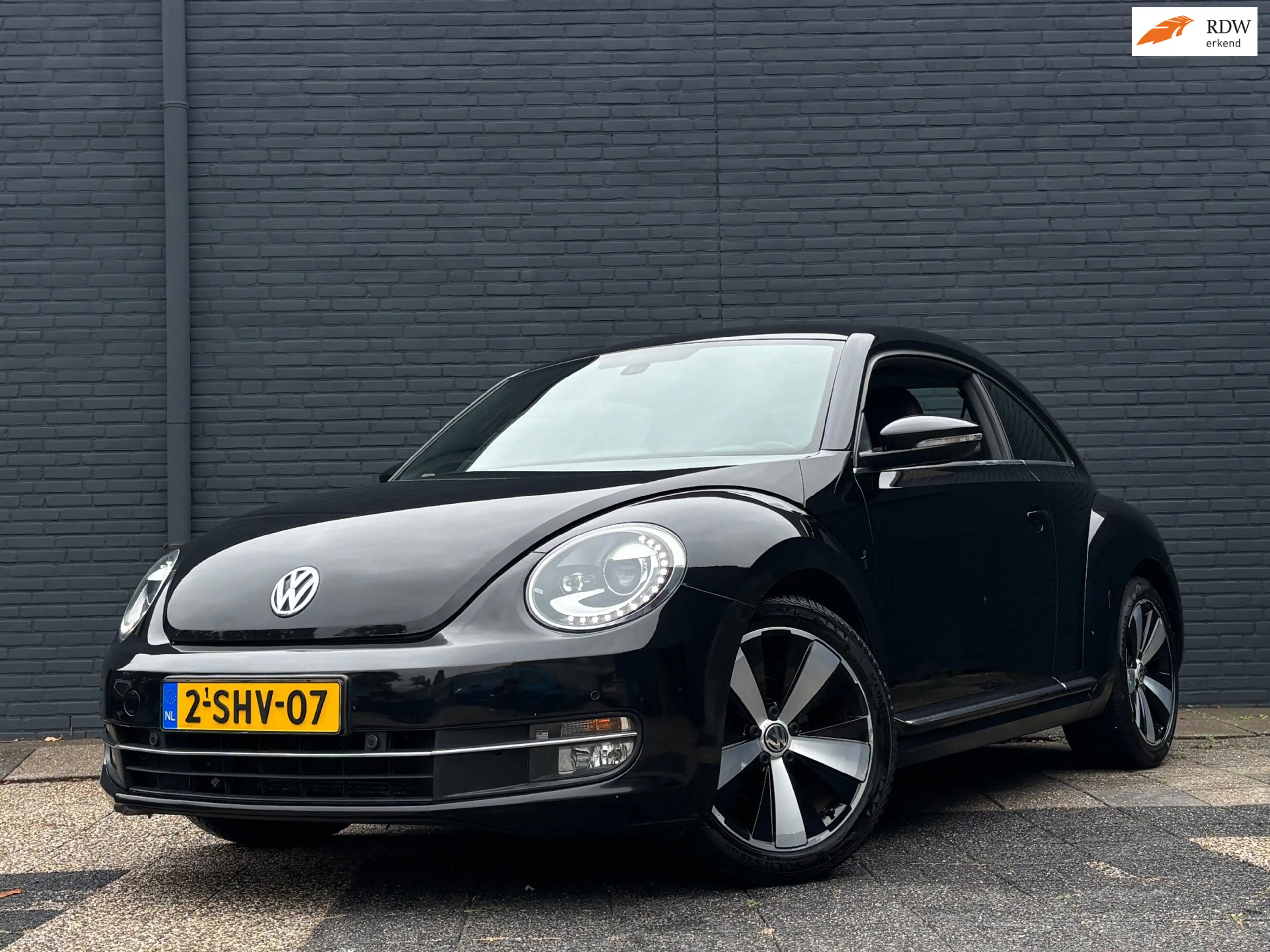 Volkswagen Beetle 1.2 TSI Design | Leder | Stoelverwarming | Fender