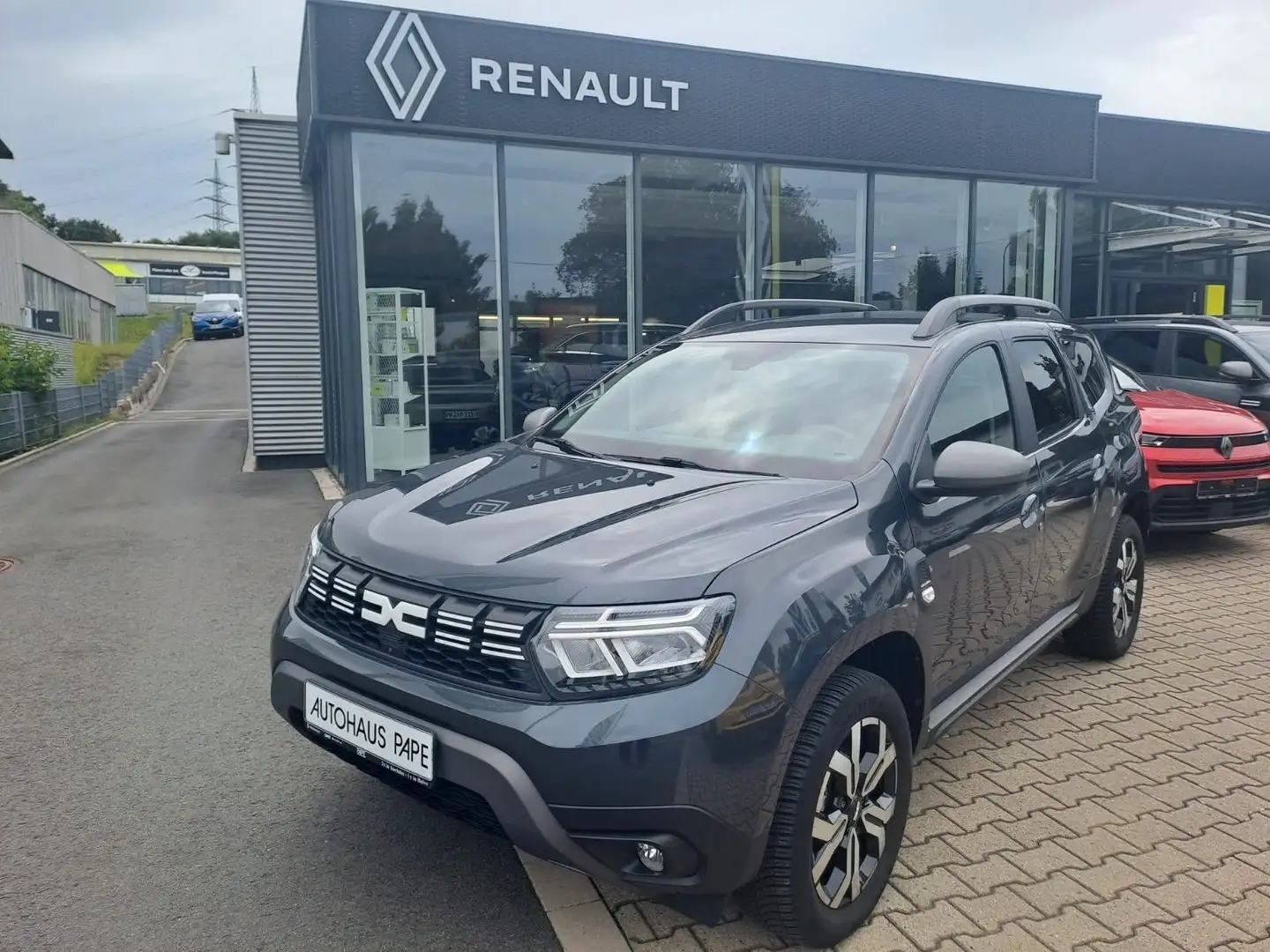 Dacia Duster TCe 150 4WD Journey+ *AHK* Grau - 1