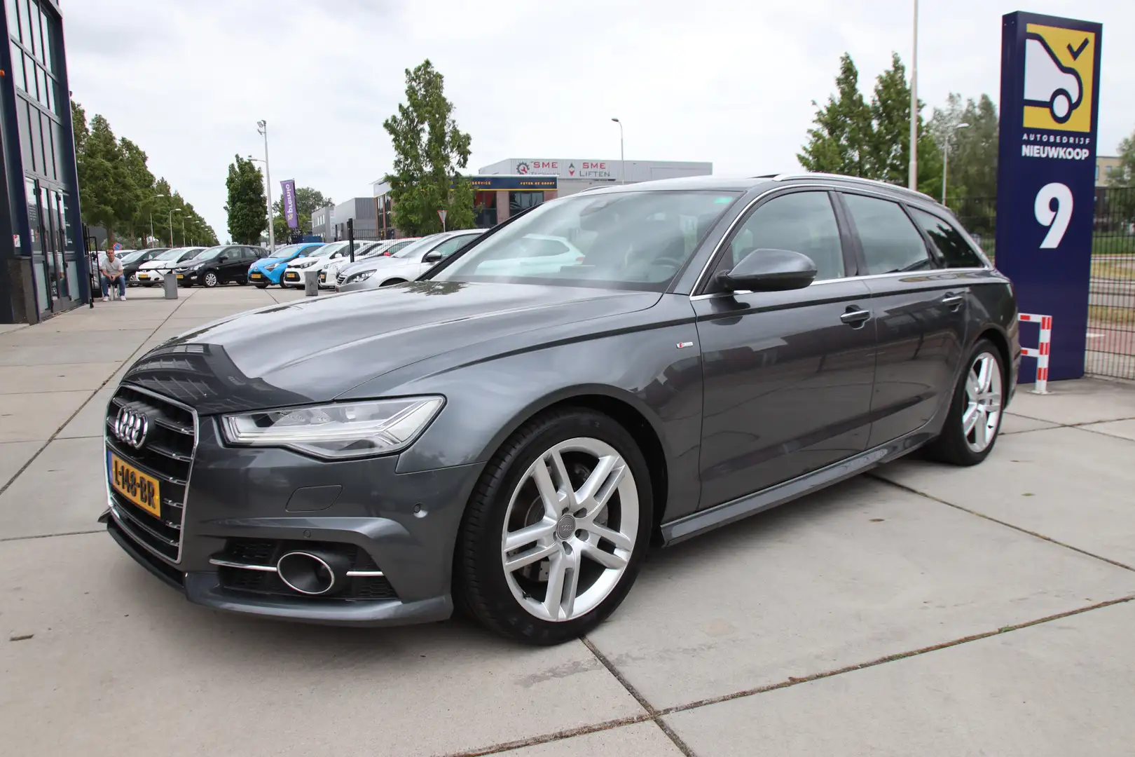 Audi A6 Avant 2.0 TFSI quattro S line Edition Pano, Luchtv Grijs - 1