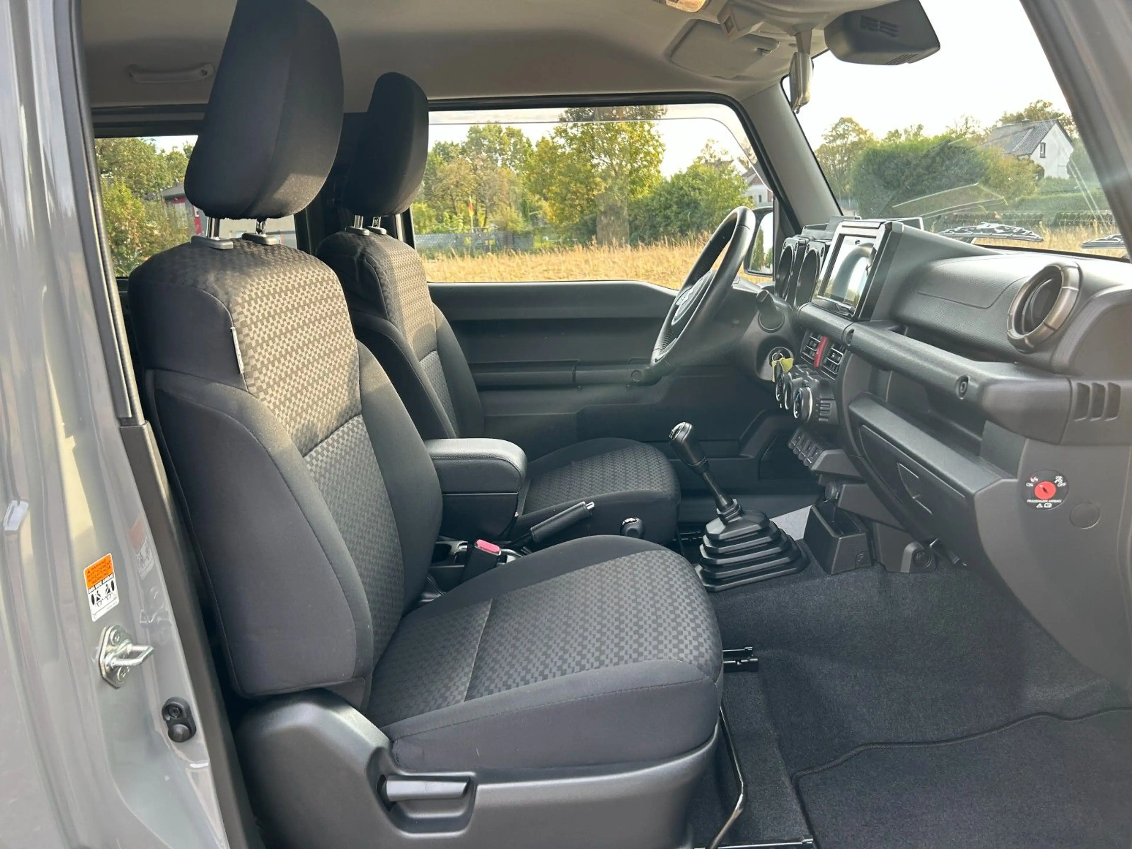 Suzuki Jimny Comfort+ AllGrip 1.5 Navi Höherlegung AHK — photo 19