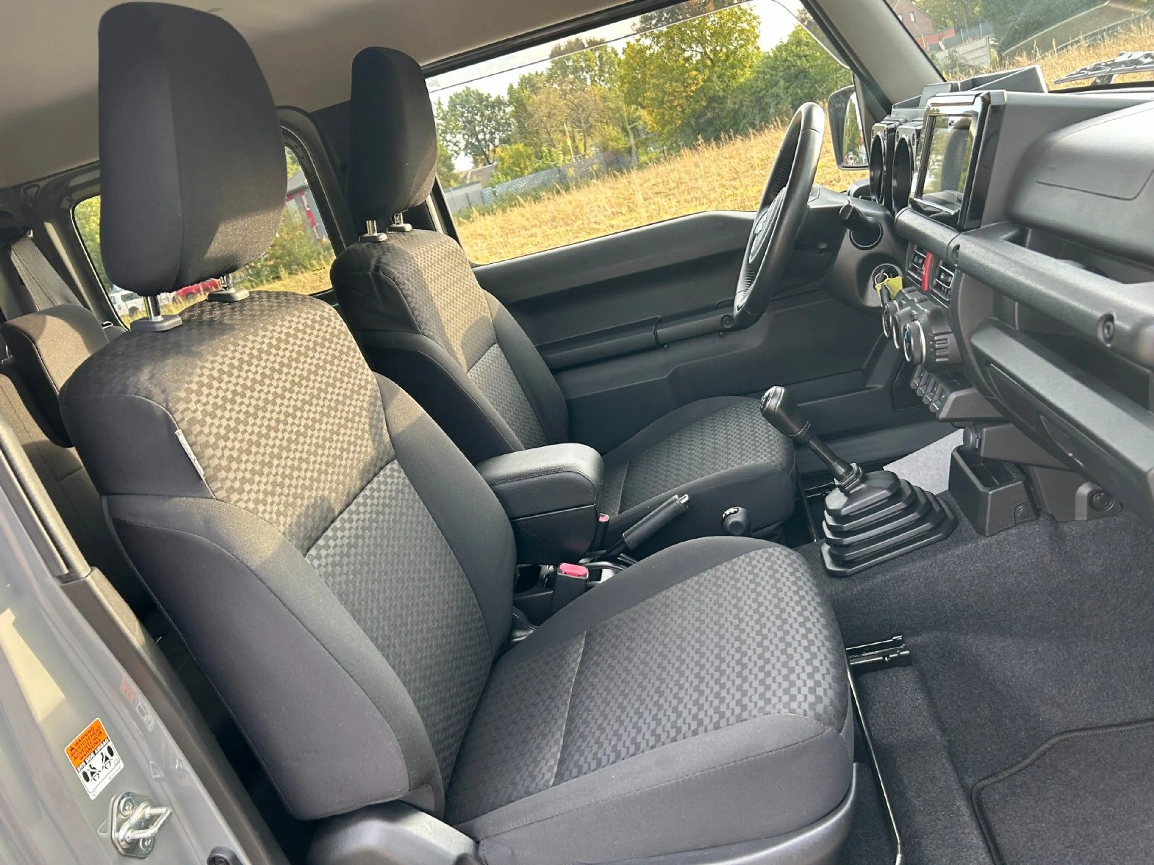 Suzuki Jimny Comfort+ AllGrip 1.5 Navi Höherlegung AHK — photo 25