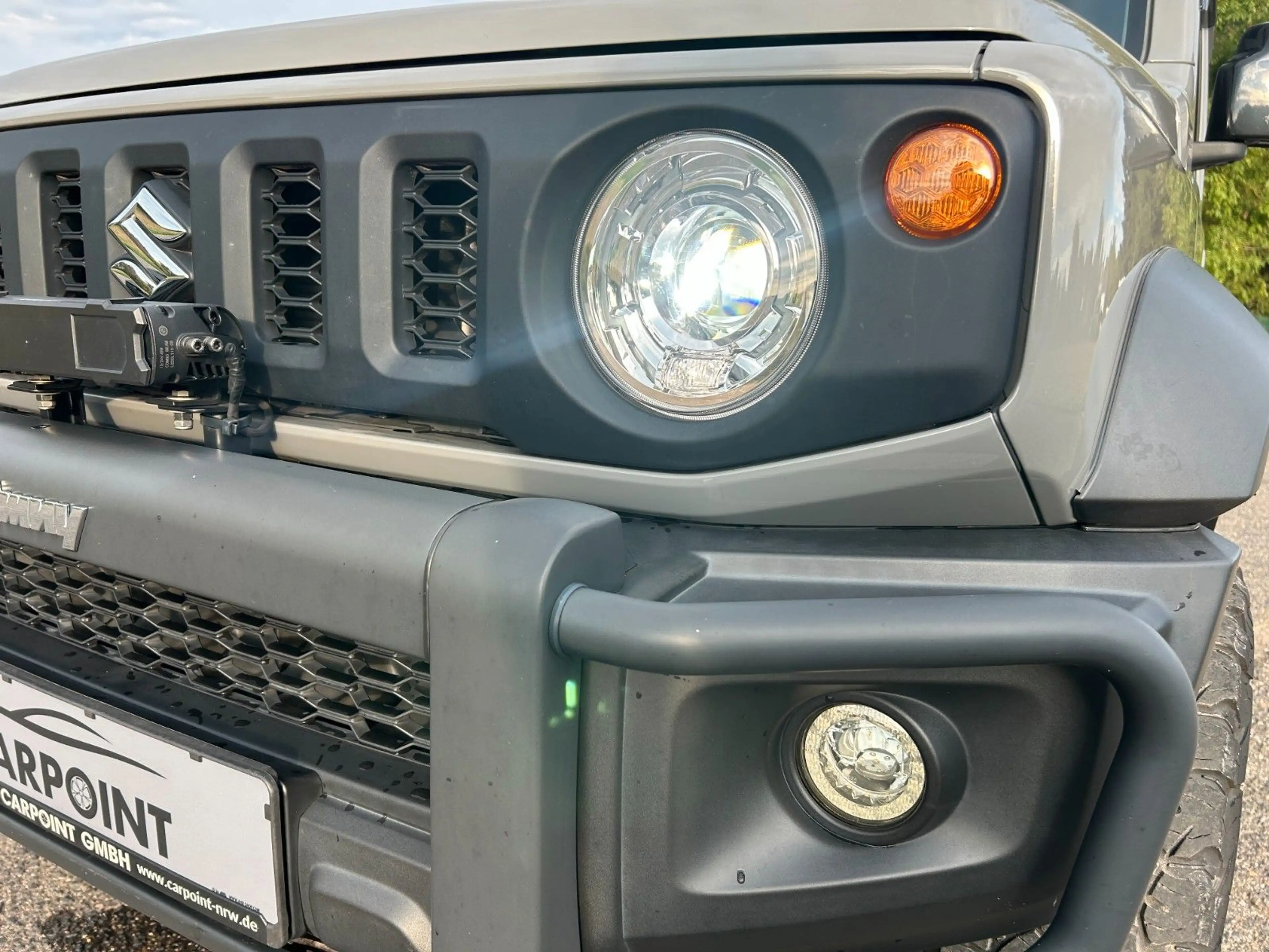 Suzuki Jimny Comfort+ AllGrip 1.5 Navi Höherlegung AHK — photo 37