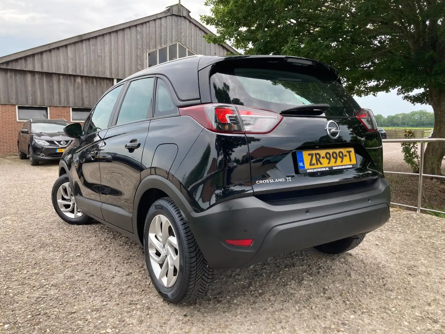 Opel Crossland X 1.2 Innovation | Carplay + Navi + Airco + Cruise n Schwarz - 2