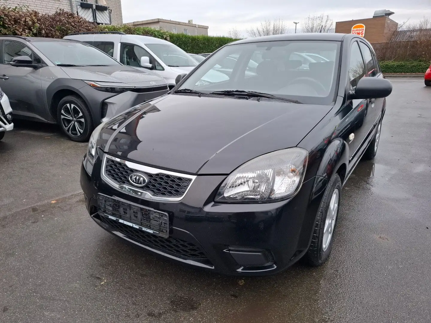 Kia Rio 1.4 Attract Schwarz - 1