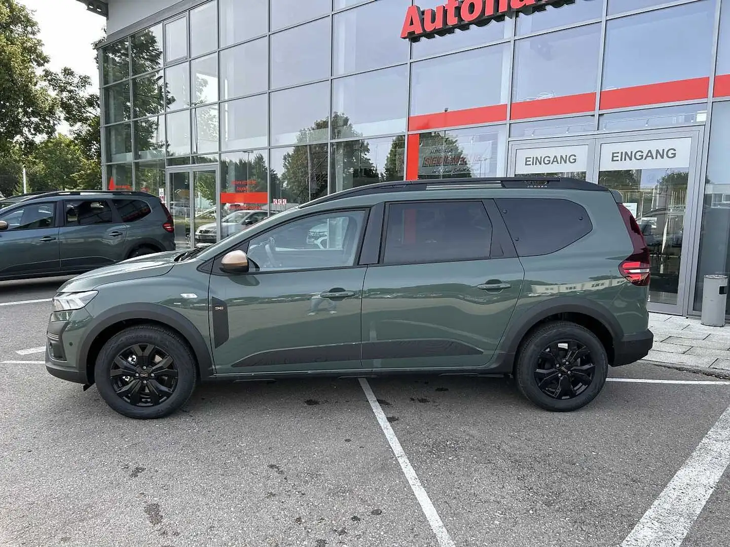 Dacia Jogger Extreme+ TCe 110 7-Sitzer *NAVI/SHZ/KAMERA/PDC* Grün - 1