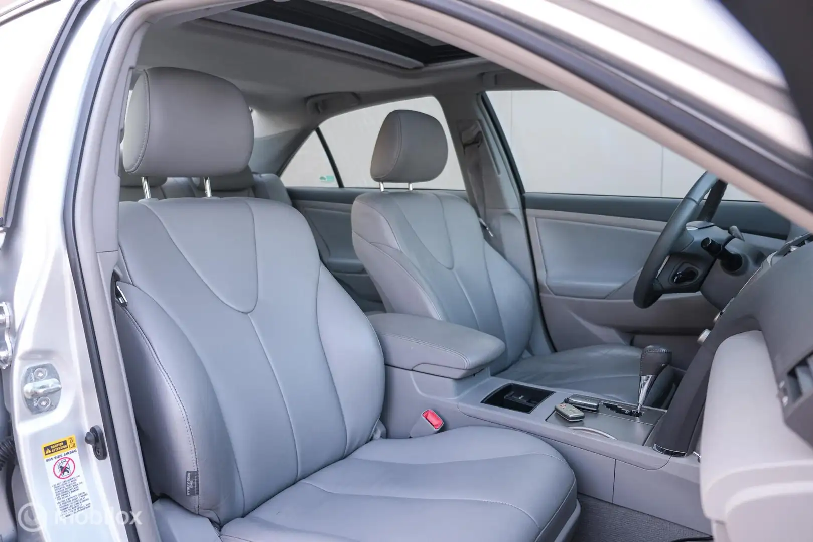 Toyota Camry 2.4 Hybrid automaat | Dealer OH | Schuifdak | youn Grijs - 2