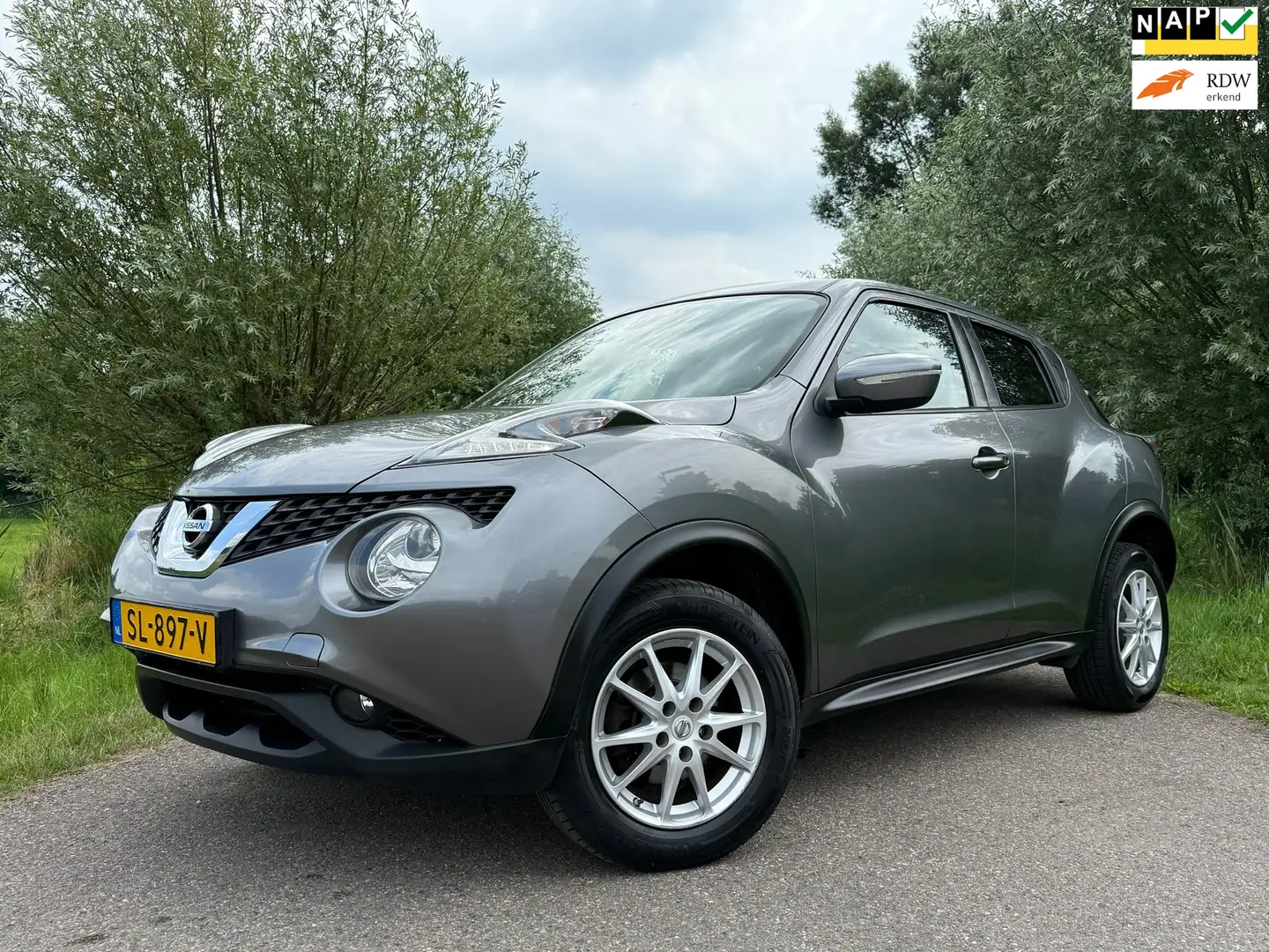 Nissan Juke 1.2 DIG-T S/S Connect Edition | Camera | Navi | Tr Grau - 1