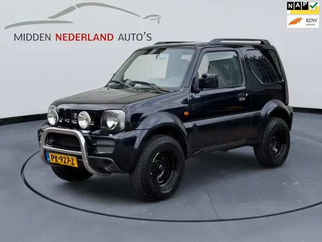 Suzuki Jimny 1.3 JLX * VERHOOGD * APK 2026 * TREKHAAK * AIRCO *