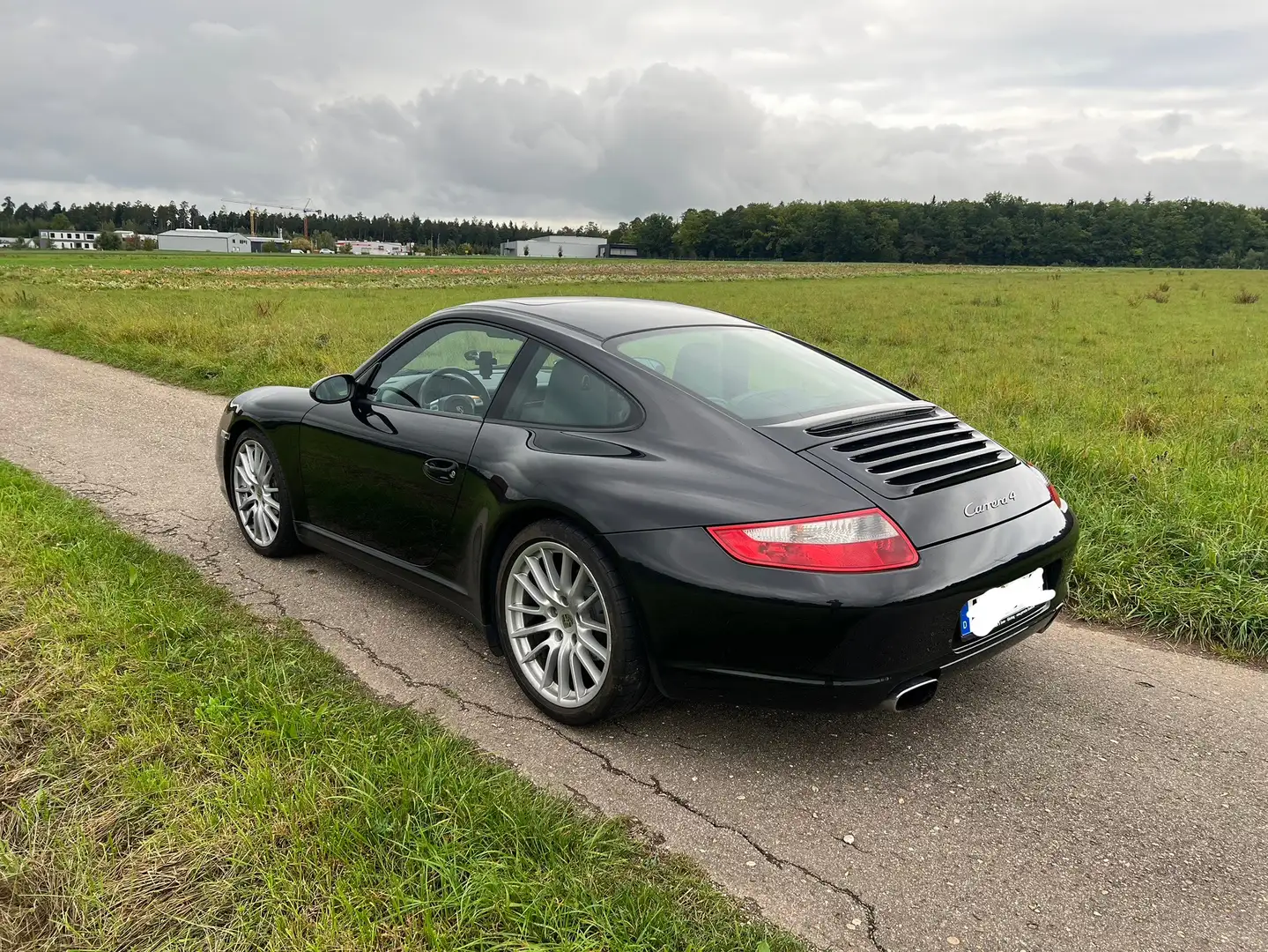 Porsche 997 Carrera 4 Coupe Schwarz - 2