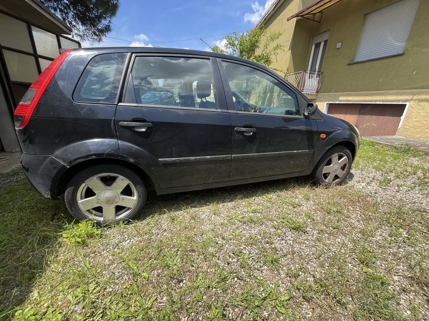 Ford Fiesta 5p 1.4i Ghia cat. - 1