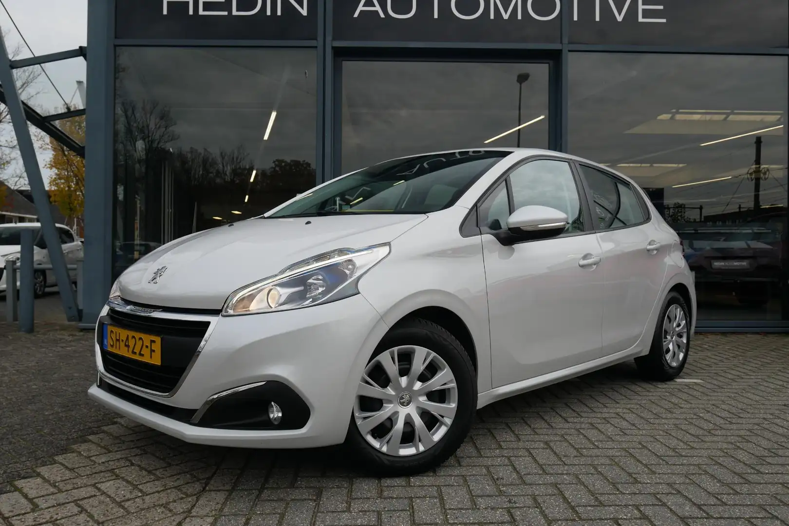Peugeot 208 1.2 Blue Lion | Trekhaak | Navigatie | Sensoren | Blanc - 2