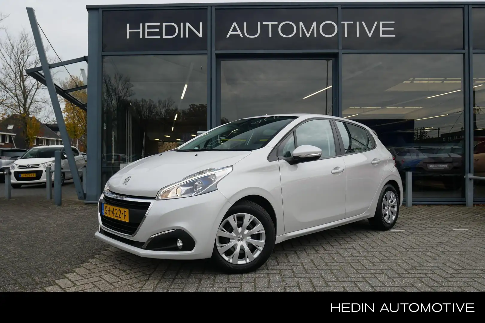 Peugeot 208 1.2 Blue Lion | Trekhaak | Navigatie | Sensoren | Blanc - 1