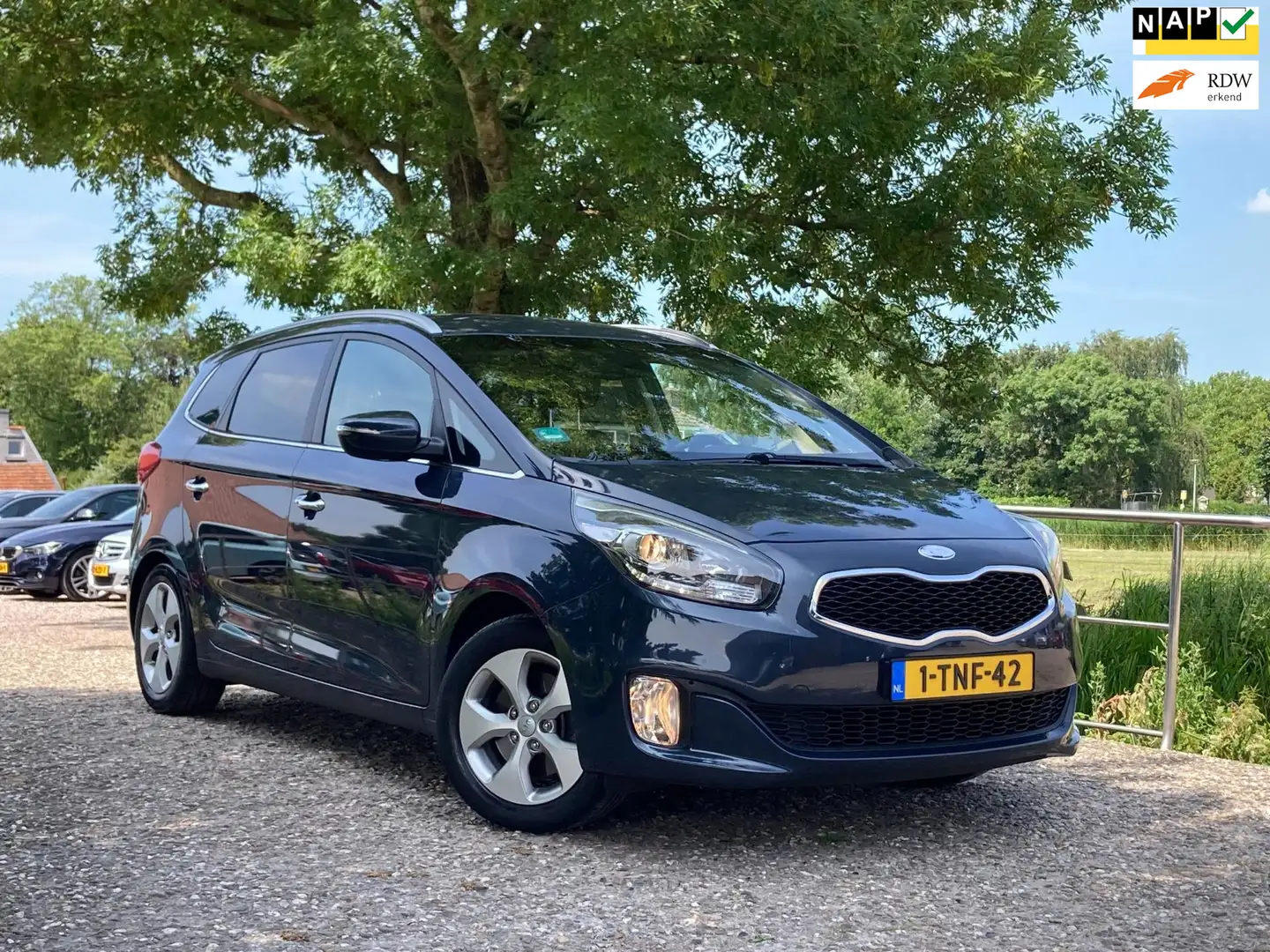 Kia Carens 1.6 GDi Super Pack | 7-Pers. + Leder + Cruise + Cl Blauw - 1