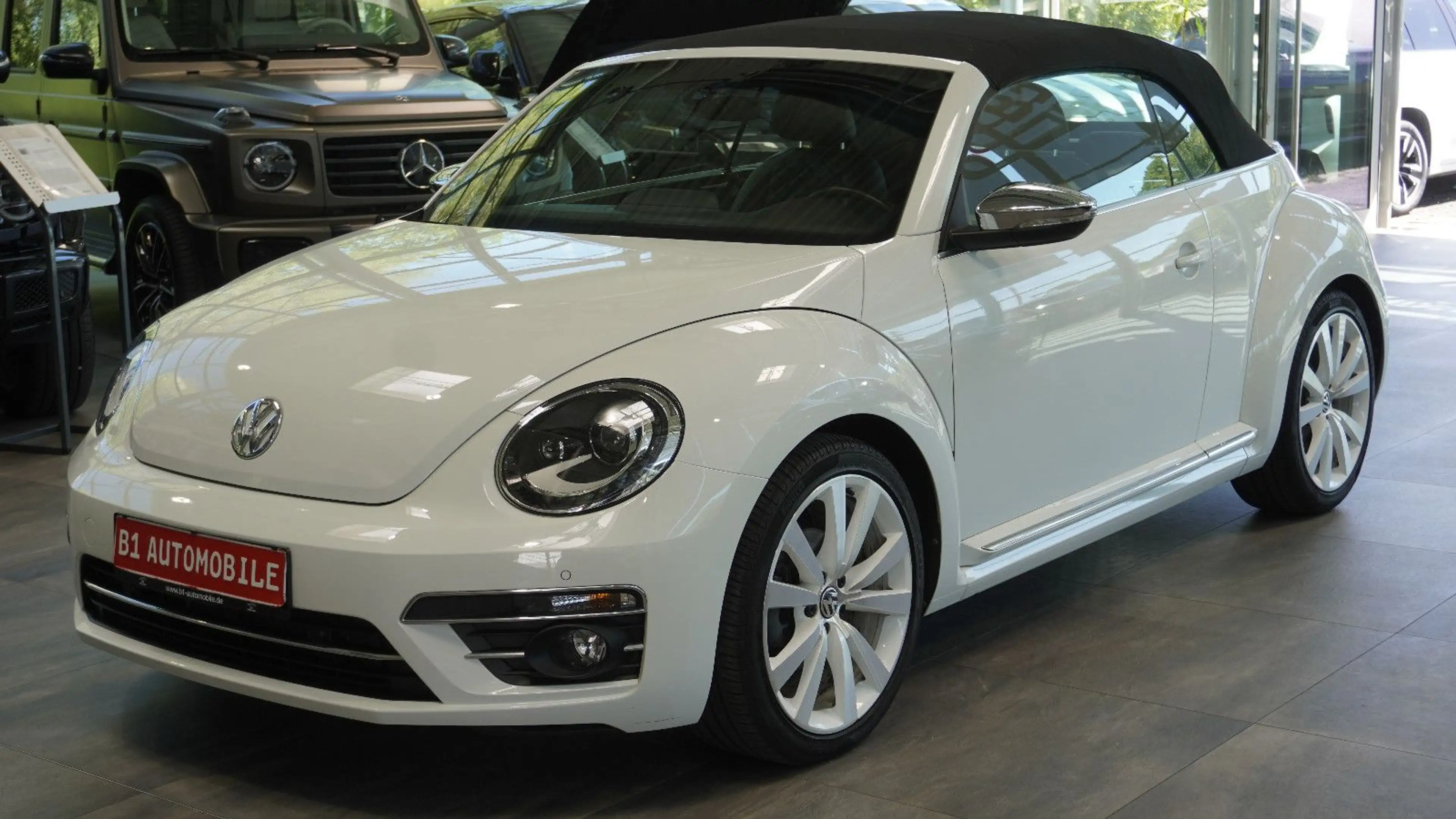 Volkswagen Beetle Cabriolet Exclusive Design*LEDER*CAM* — photo 2