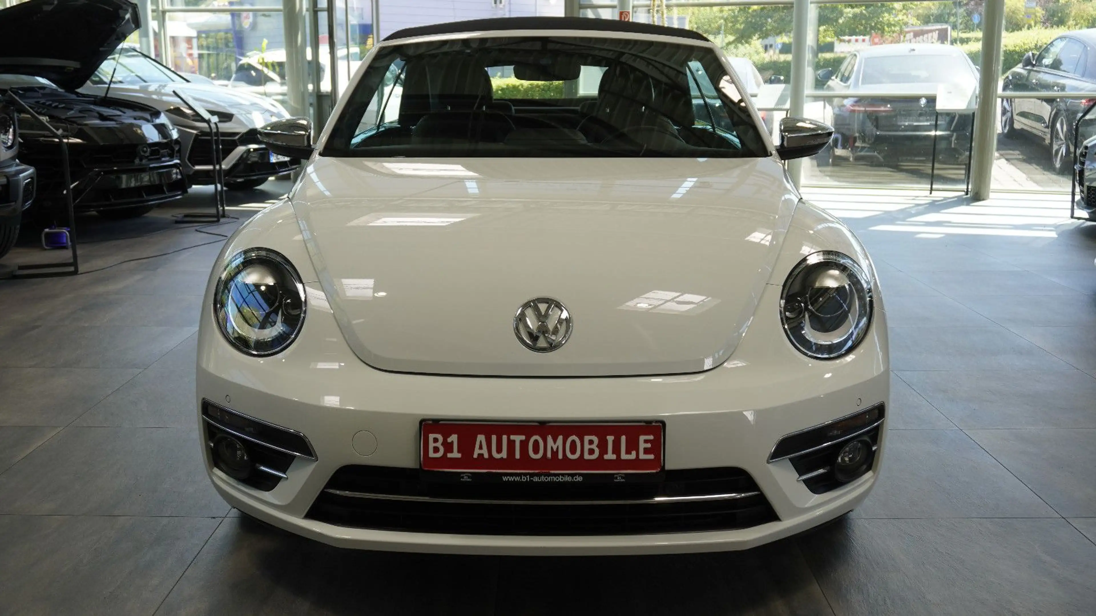 Volkswagen Beetle Cabriolet Exclusive Design*LEDER*CAM* — photo 3