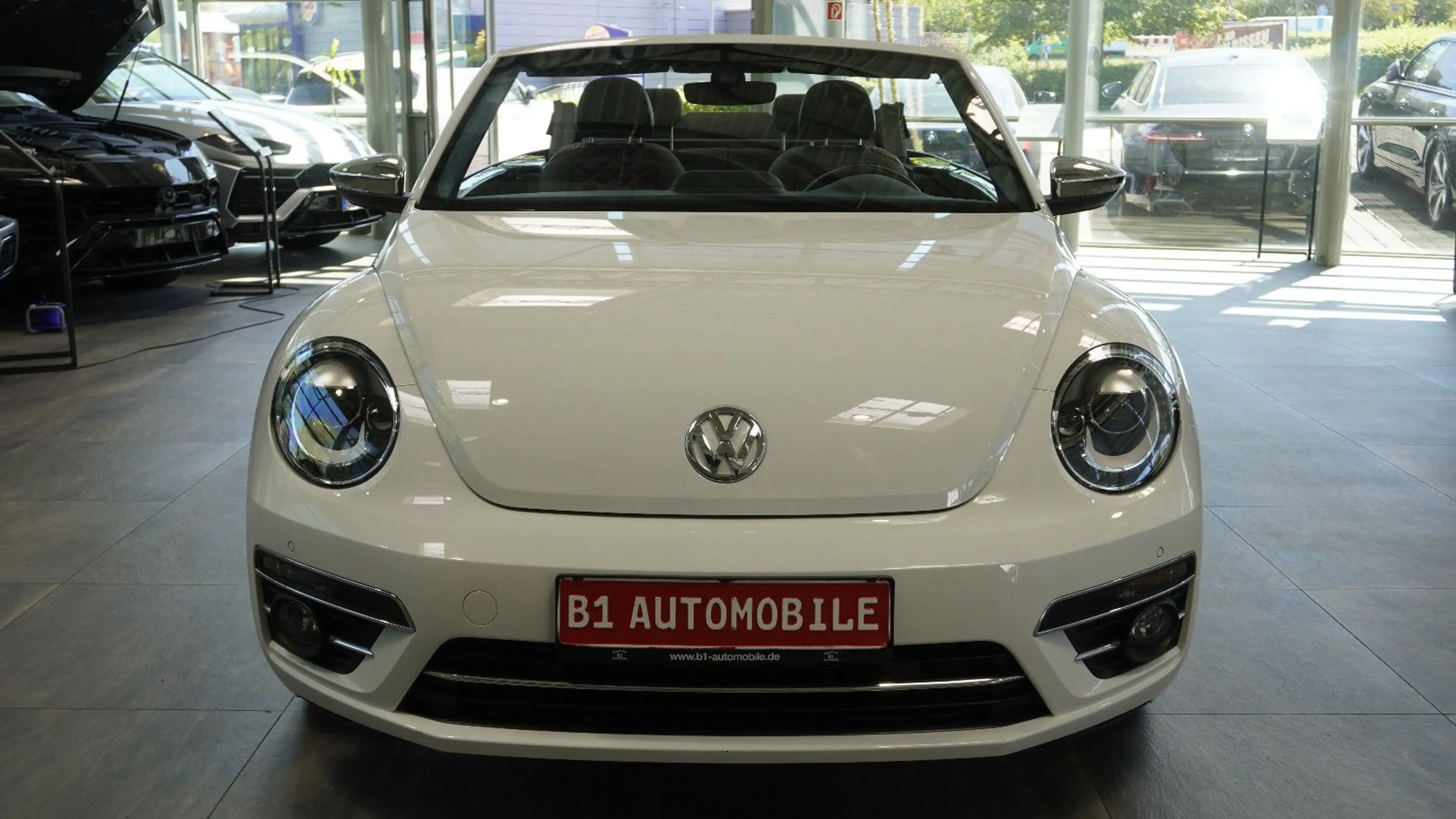 Volkswagen Beetle Cabriolet Exclusive Design*LEDER*CAM* — photo 9