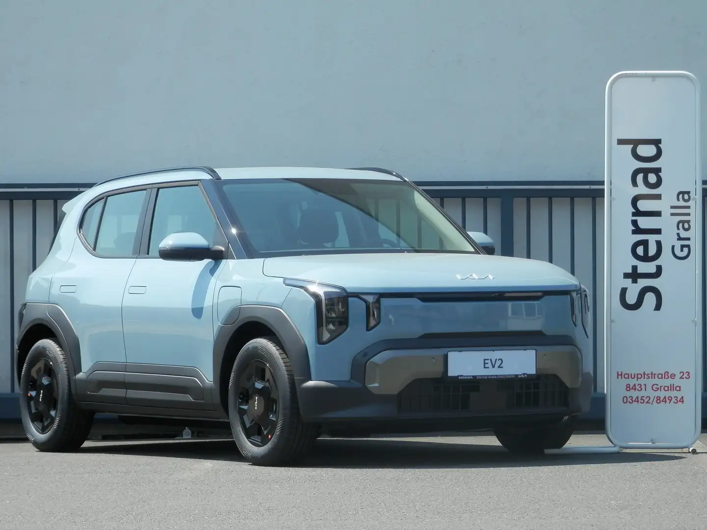 Kia EV2 5S FWD 61kWh Earth & P1 Tech Pack Blau - 1