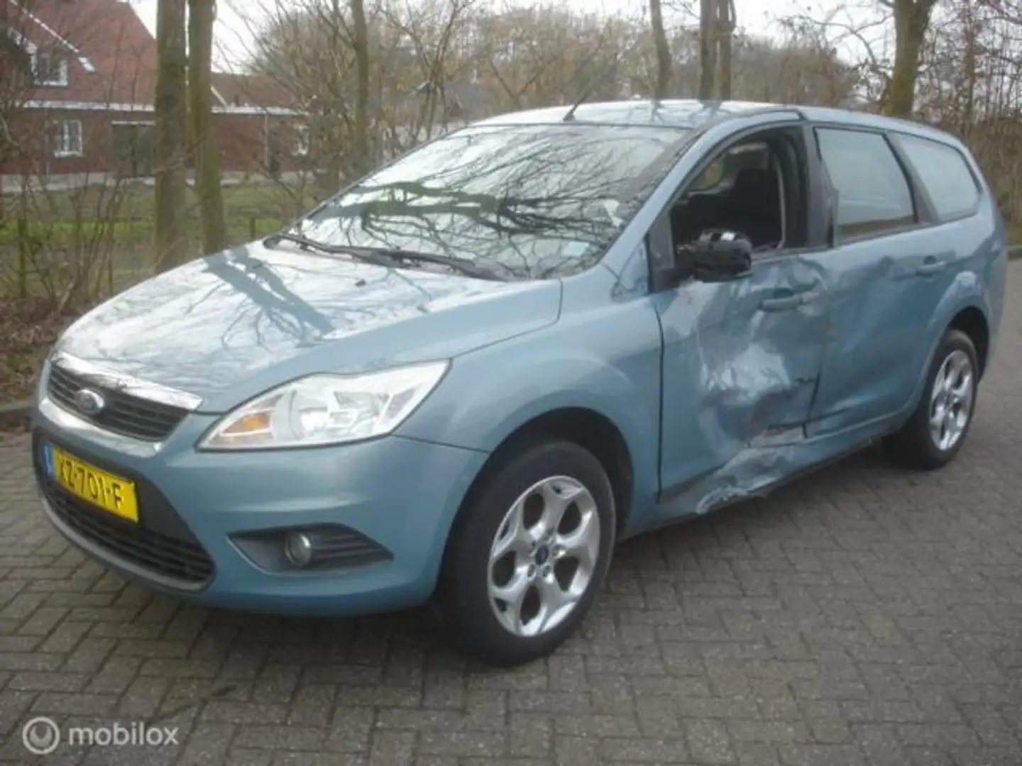 Ford Focus Wagon 1.6 Titanium Airco cruise. Zware zijschade Grau - 1