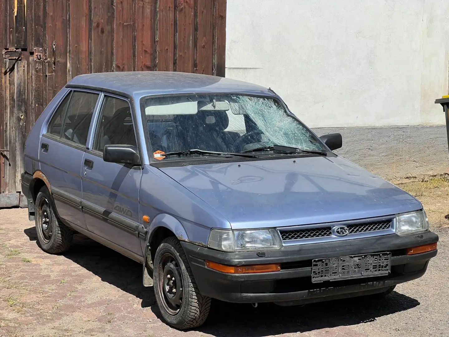 Subaru Justy Серебристый - 1
