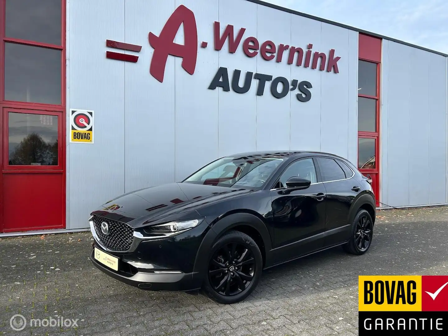 Mazda CX-30 2.0 e-SkyActiv-G M Hybrid Homura Zwart - 1