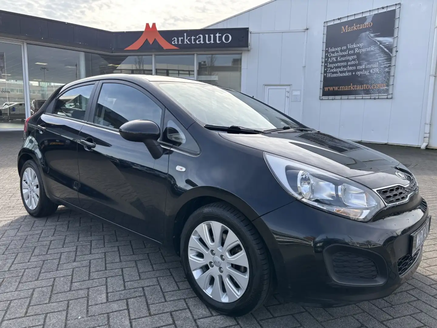 Kia Rio 1.2 CVVT Plus Pack Airco Aux/Usb Noir - 1