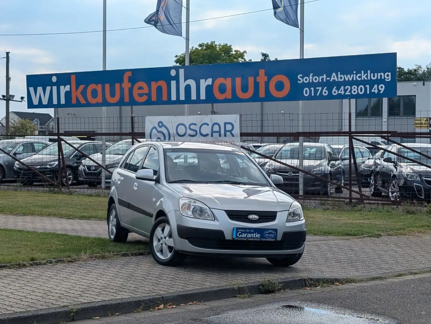 Kia Rio 1.6 CVVT Spirit*AUTOMATIK*RADIO-CD*ZV-FUNK ! Ezüst - 1