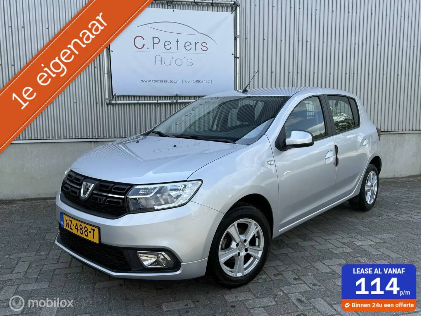 Dacia Sandero 0.9 TCe Laureate 2017 / Airco / Navigatie / DAB / Grijs - 1