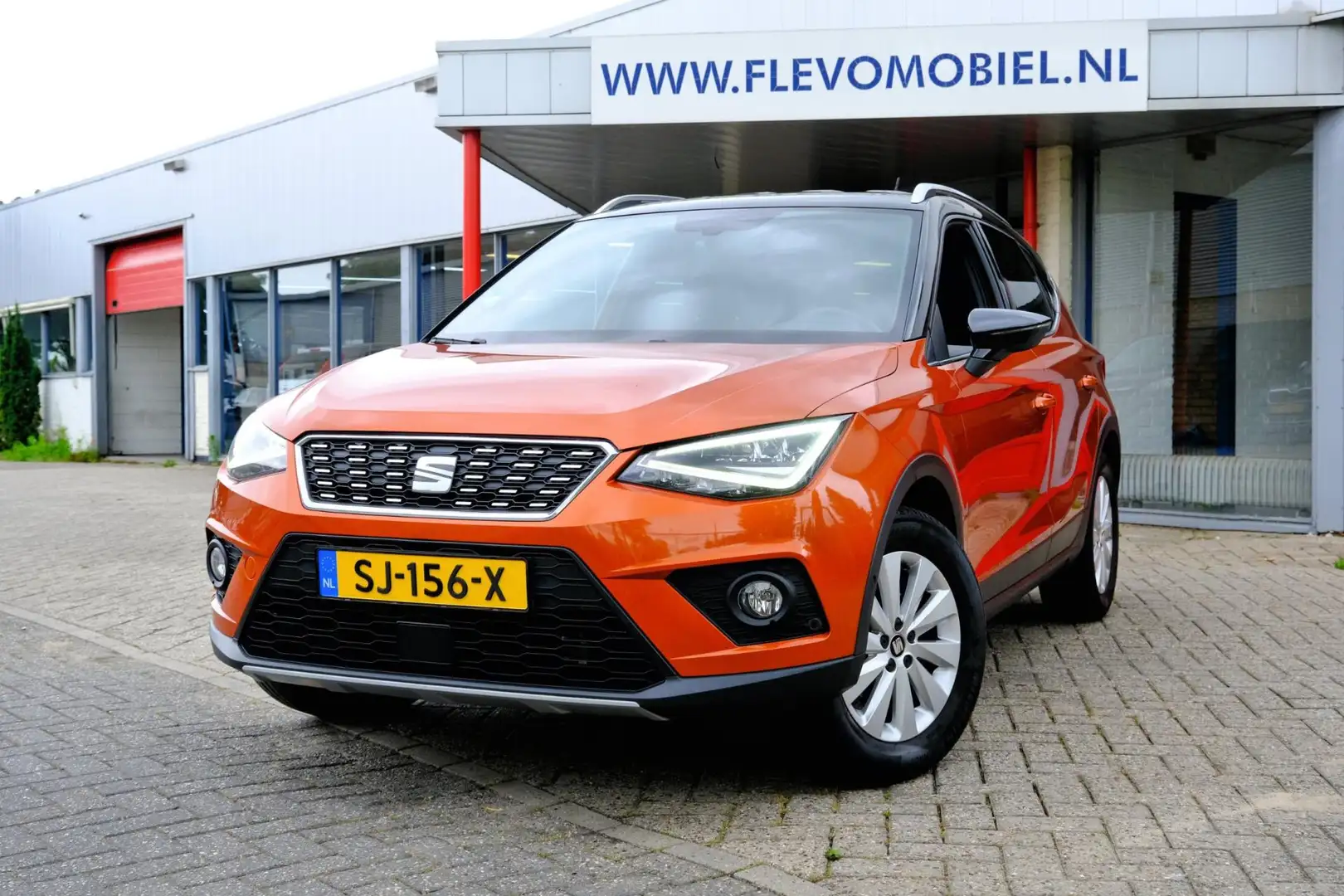 SEAT Arona 1.0 TSI Xcellence Launch Edition Navi|Cam|Apple Ca Oranje - 1