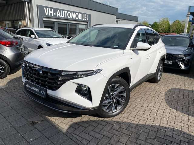 Imagine Hyundai TUCSON 132KW*NAVI&R:KAMERA&PDC vo&hi*Lenkrad&Sitzhz*S-Key