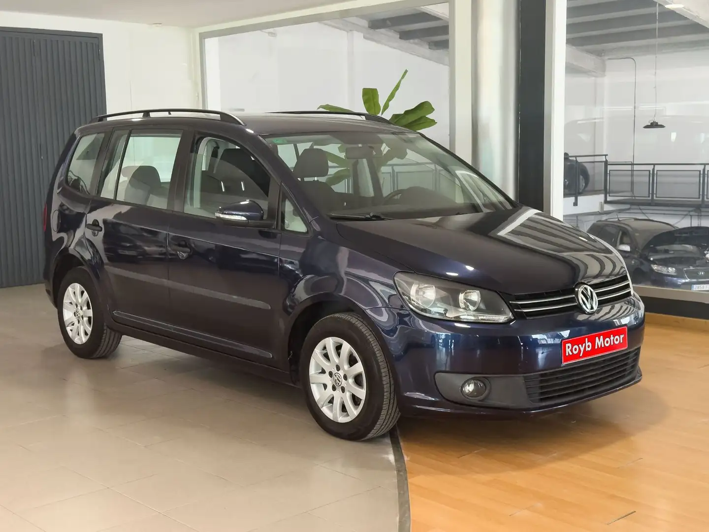 Volkswagen Touran 1.6TDI Advance 105 Blau - 1