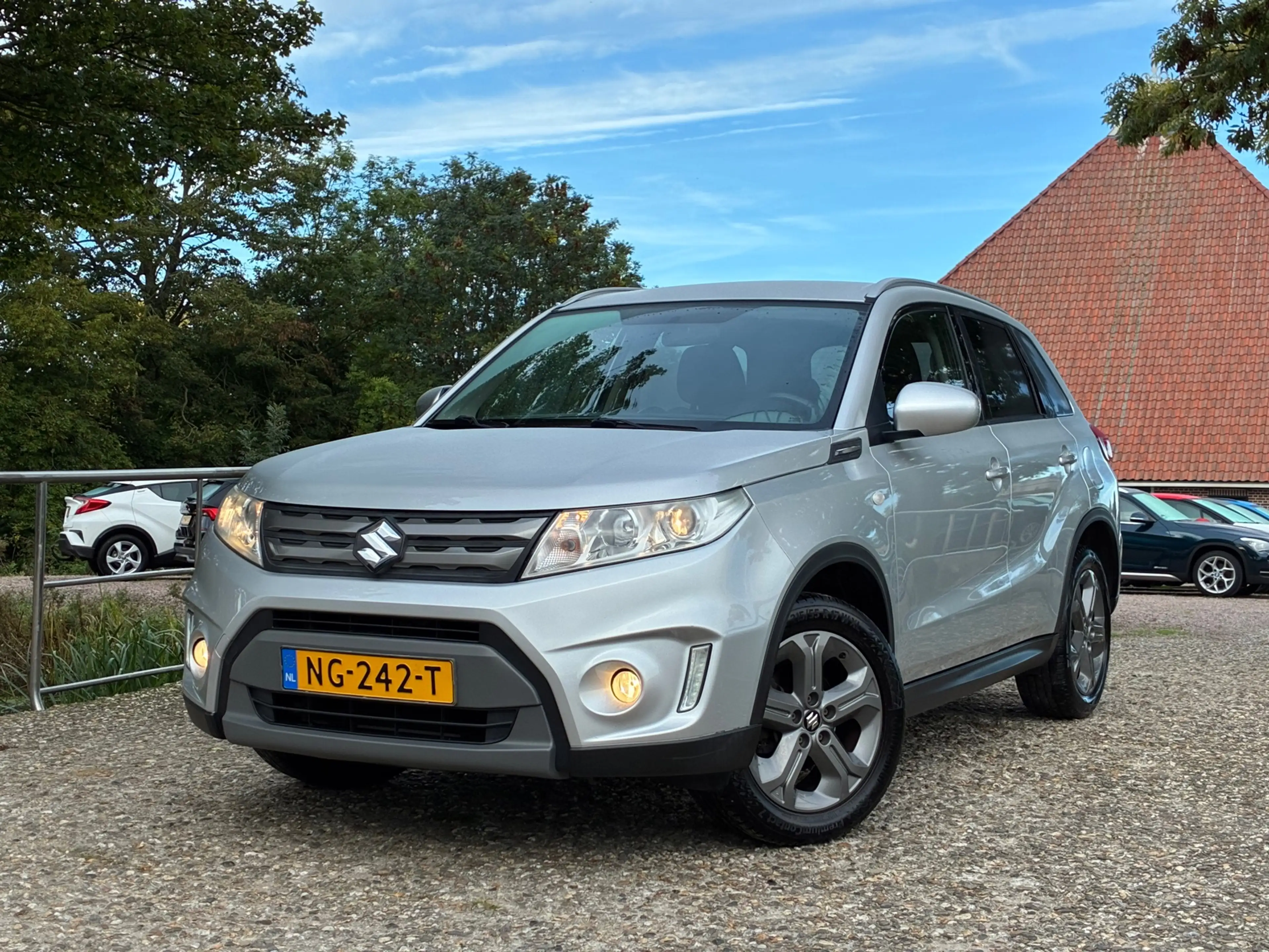 Suzuki Vitara 1.6 Exclusive | Carplay + Clima + Cruise nu €9.975 — photo 4