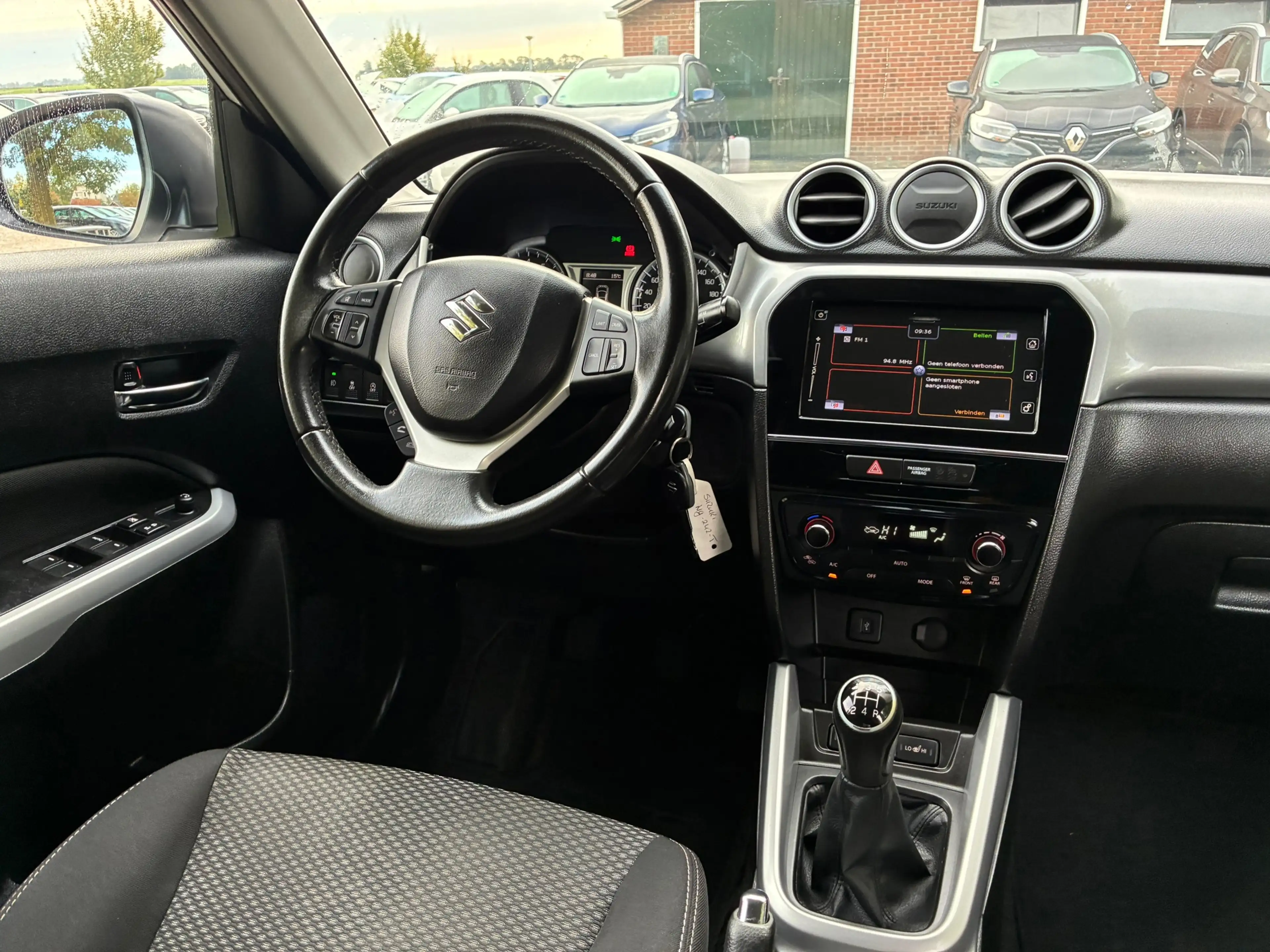 Suzuki Vitara 1.6 Exclusive | Carplay + Clima + Cruise nu €9.975 — photo 3