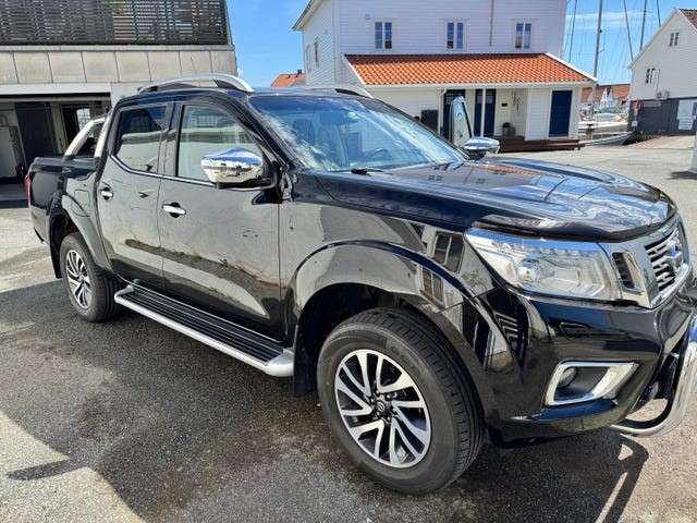 Nissan Navara 2.5 dCi 174 ch Double Cab Confort A - foto 1