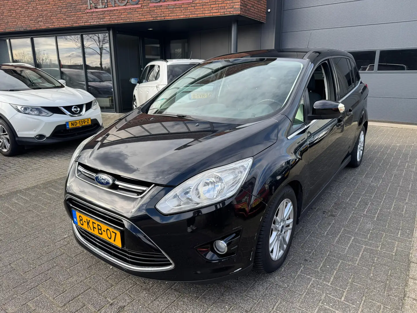 Ford Grand C-Max 1.0 Titanium NAVI CRUISE CLIMA PDC ORIG NL NAP SUP Schwarz - 1
