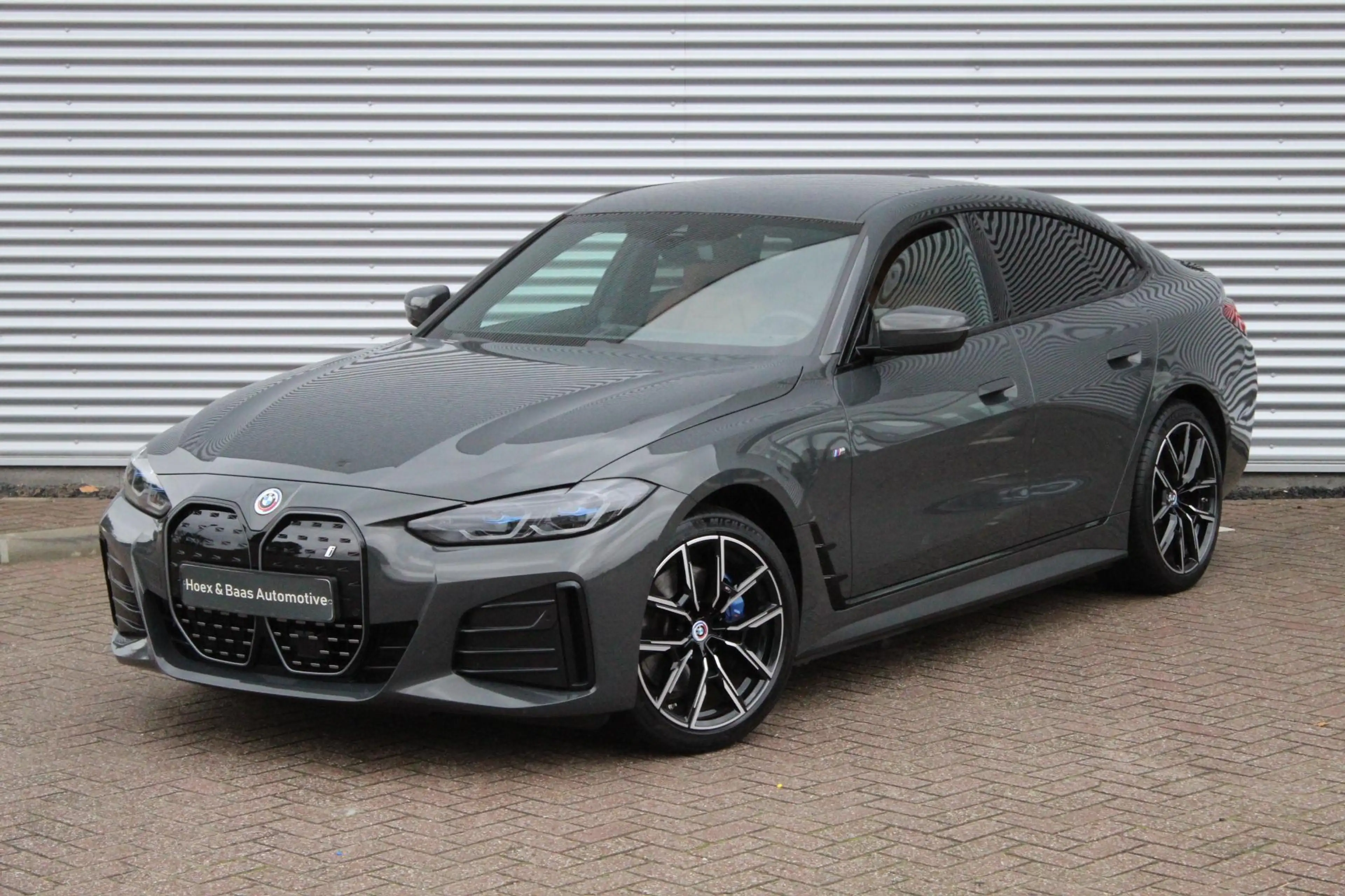 BMW i4 eDrive40 High Ex 84 kWh/Dravit/Performance stoelen — photo 25