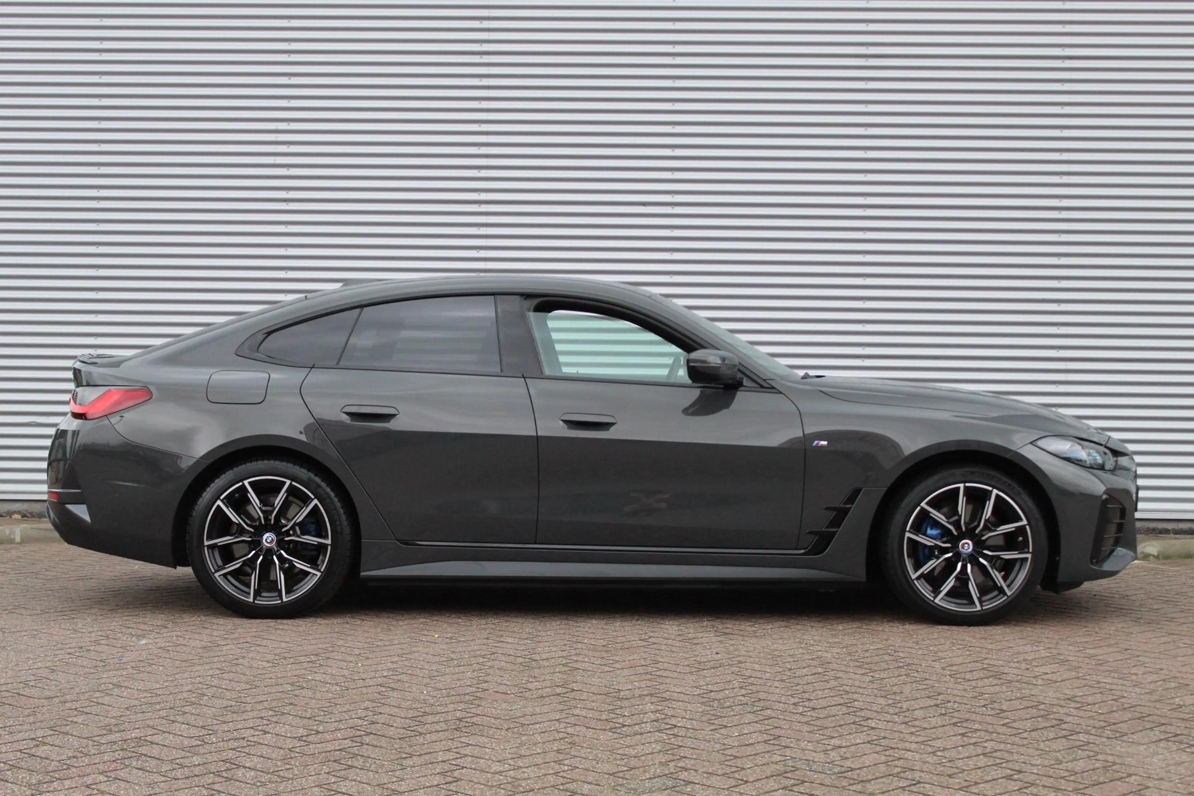 BMW i4 eDrive40 High Ex 84 kWh/Dravit/Performance stoelen — photo 4