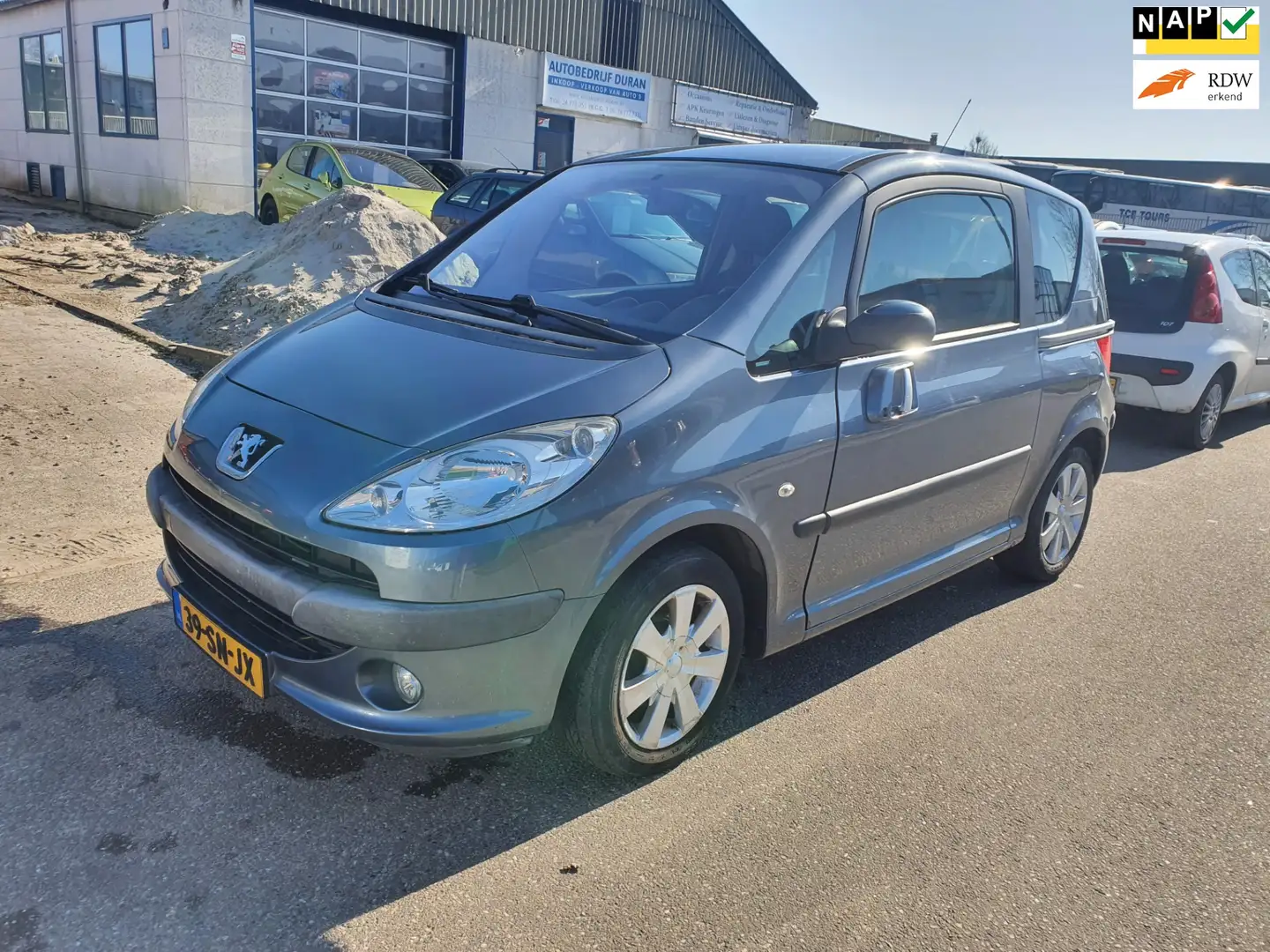 Peugeot 1007 1.4 Gentry 3-deurs Airco Bj.:2006 siva - 1