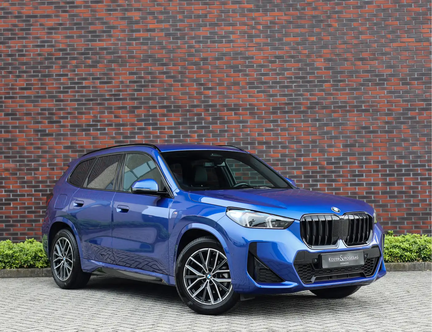 BMW X1 s-Drive 18i | Trekhaak - Premium Blauw - 1
