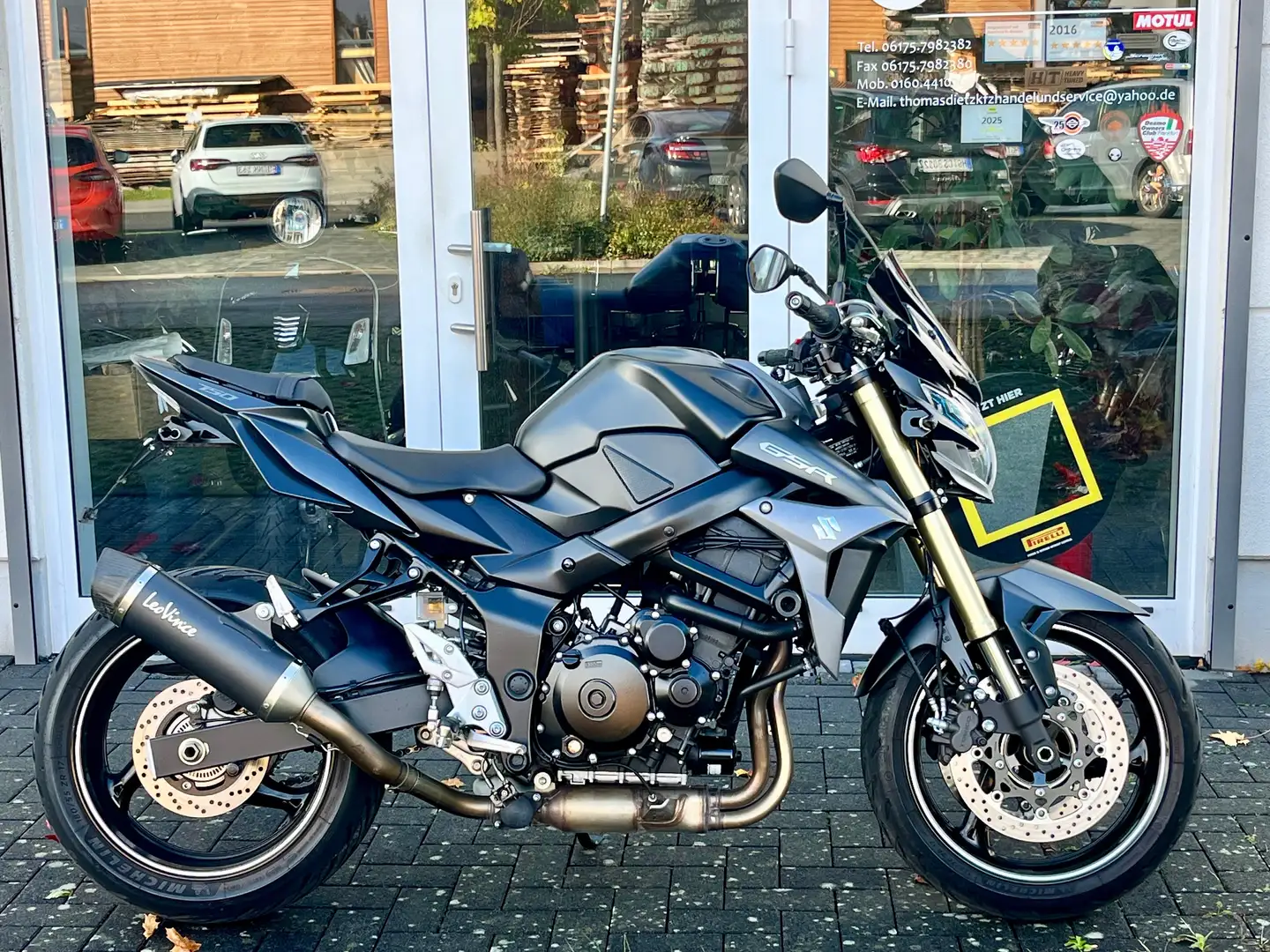 Suzuki GSR 750 1.Hd. ABS AL5 Auspuff Scheibe Service top Schwarz - 1