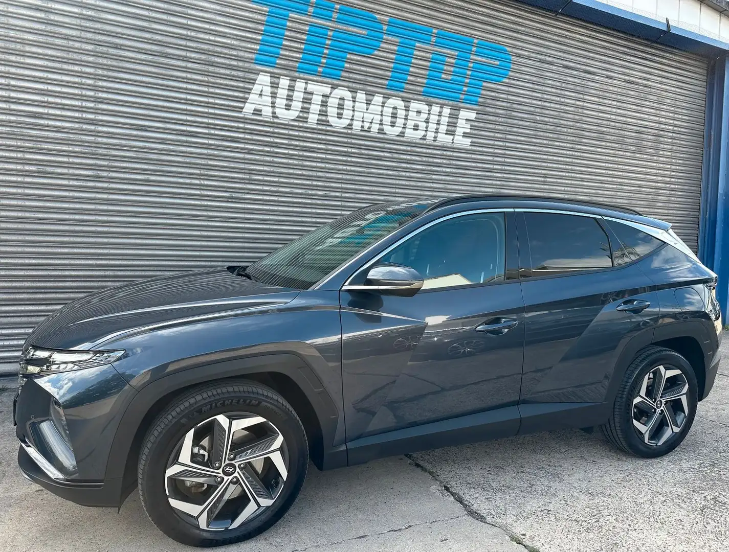 Hyundai TUCSON Prime Plug-In Hybr 4WD*AHK*LED*NAVI*LEDER Gris - 1