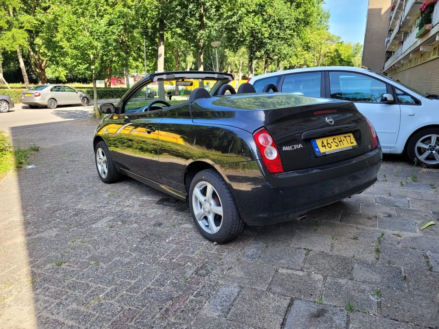 Nissan Micra C+C Cabrio 1.6 uit 2006 +AIRCO +PDC +NAP +APK Zwart - 2
